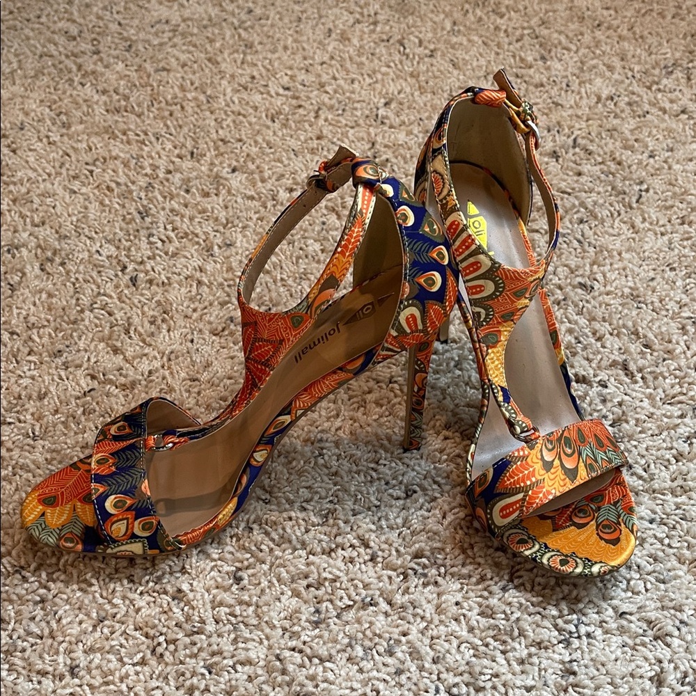 Peecock t- strap heels size 9 by Jollimall